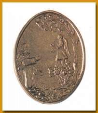 Insignias: Es un cáliz con una cruz que sale de la copa, rodeada por dos ramos de olivo. Medalla acuñada entre 1.956 y 1.992, con la escena de Jesús en el huerto.