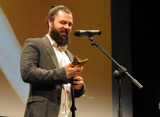 Víctor E.D. Somoza recogiendo su premio en la Semana de Cine de Medina / Cadena SER